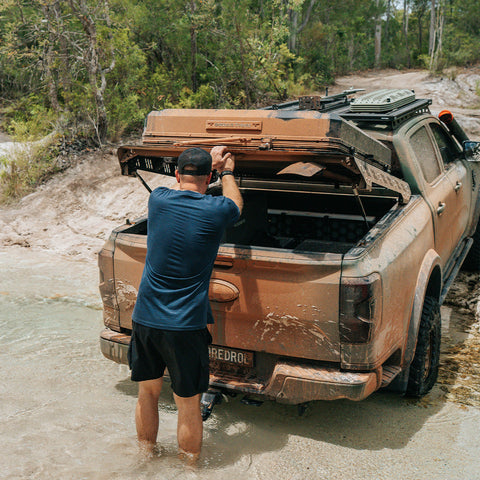 PopRack tub rack tilted open on a Next Gen Ranger