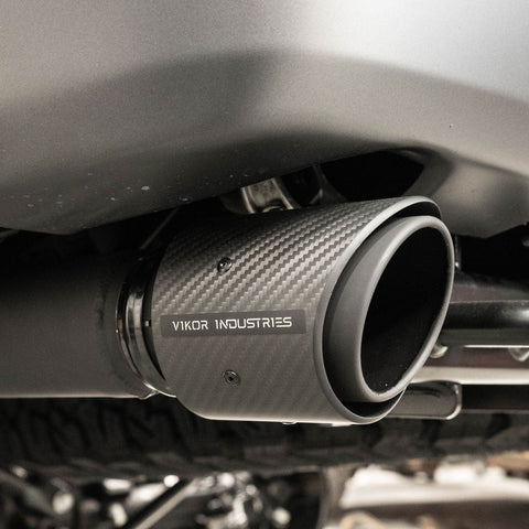 Raptor Exhaust Sandblast Black Carbon Tips on Car