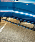 VIKOR electric side step fitted to a blue Ford Ranger PX3
