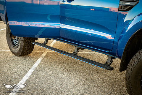VIKOR electric side step fitted to a blue Ford Ranger PX3