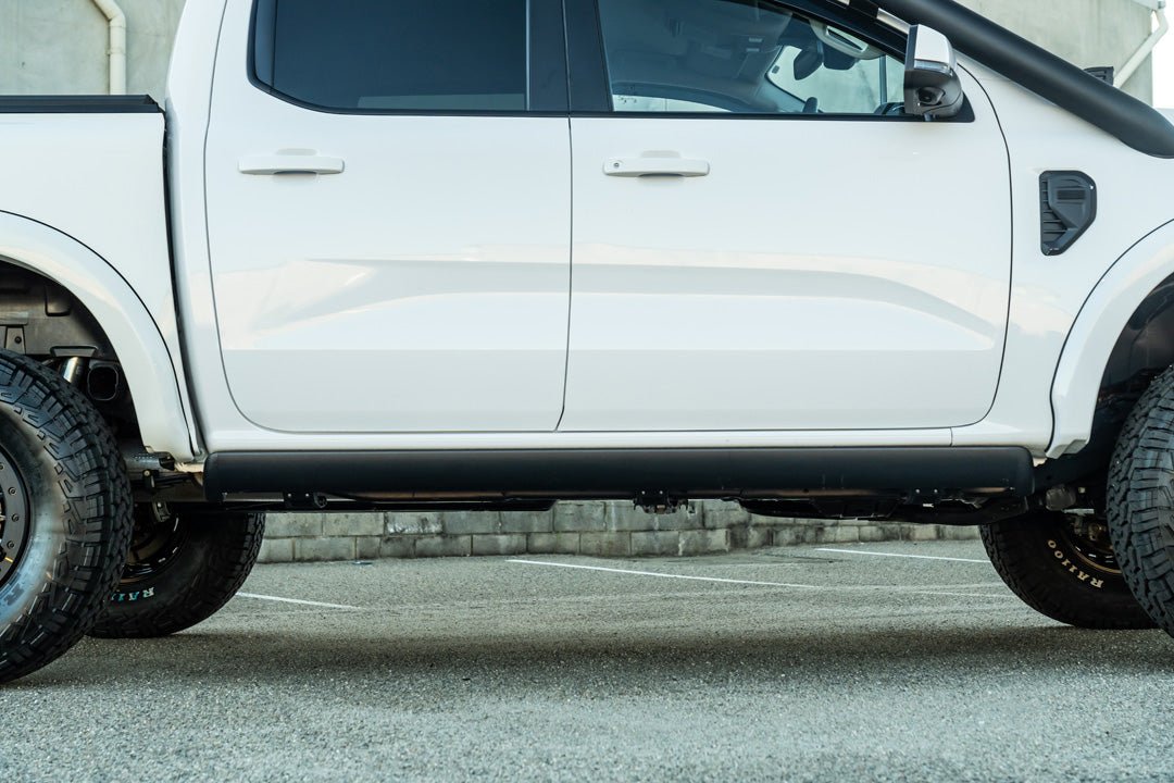 Electric Side Steps on the Next Gen Ford Ranger, rear three-quarter view