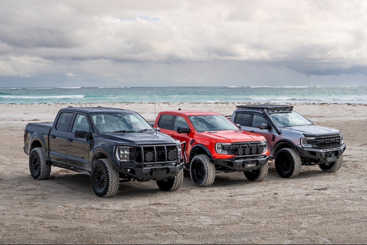 Ford F-150, Next Gen Ford Ranger Raptor and Next Gen Ford Ranger on the beach