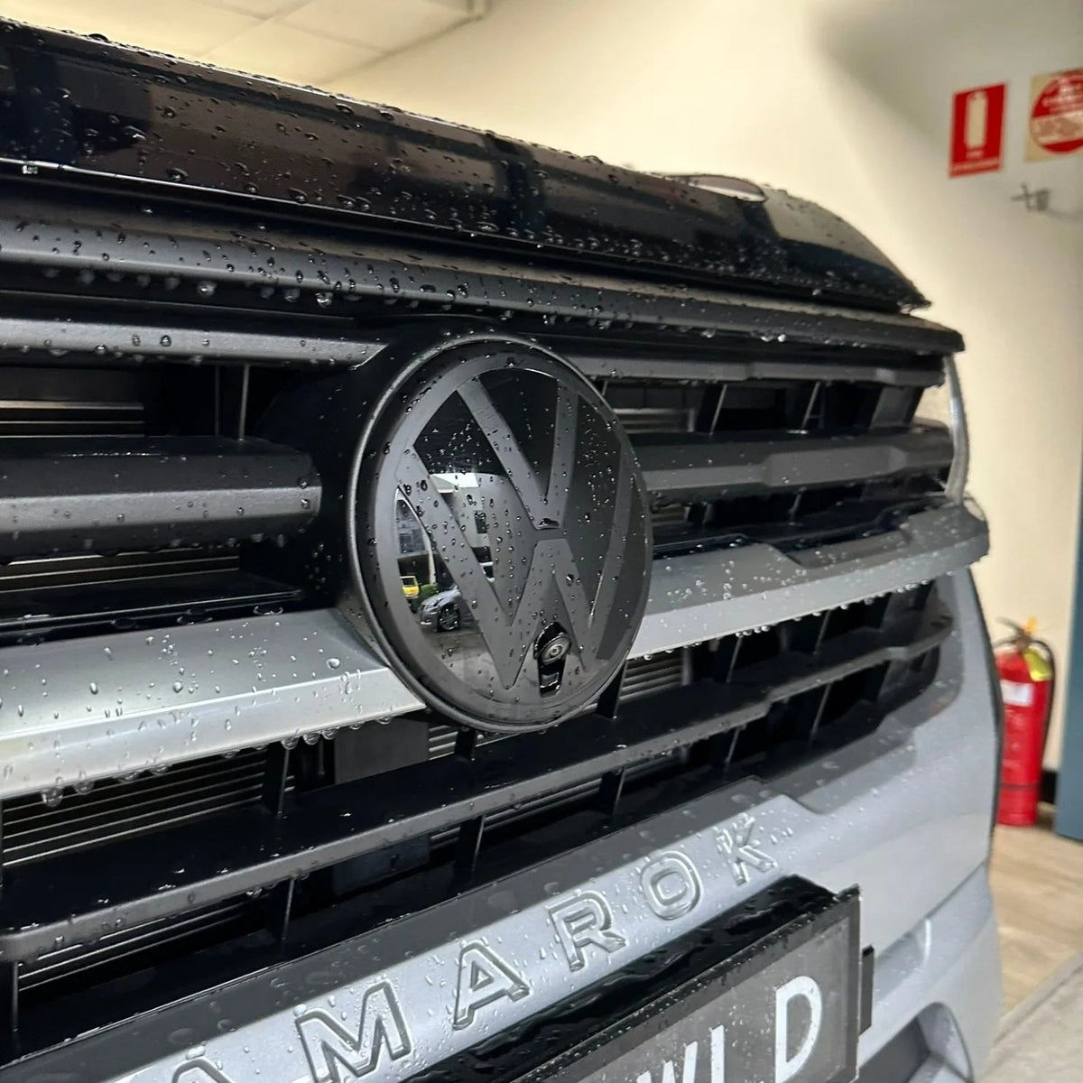 Front Badge Overlay on the Volkswagen Amarok NF, side view