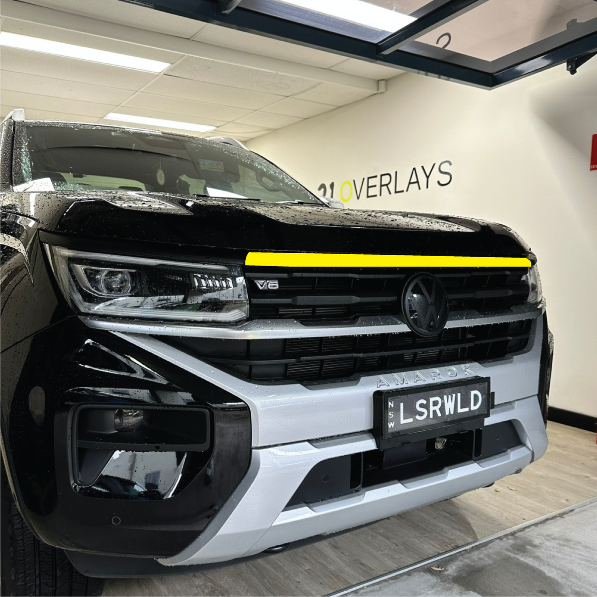 Upper Grille De-Chrome Overlay on the Volkswagen Amarok NF, side view
